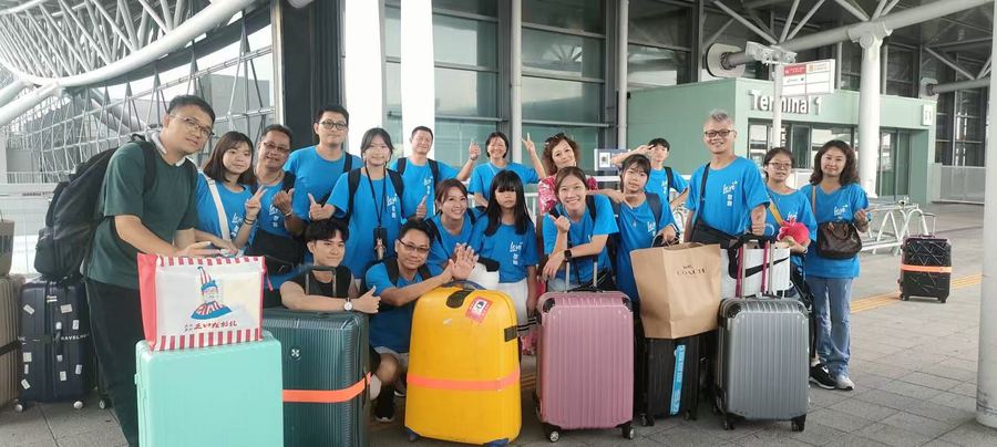 Group with luggage at Kansai Airport
