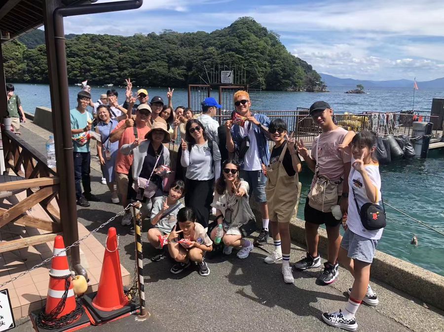 Group on the pier at Ine Bay