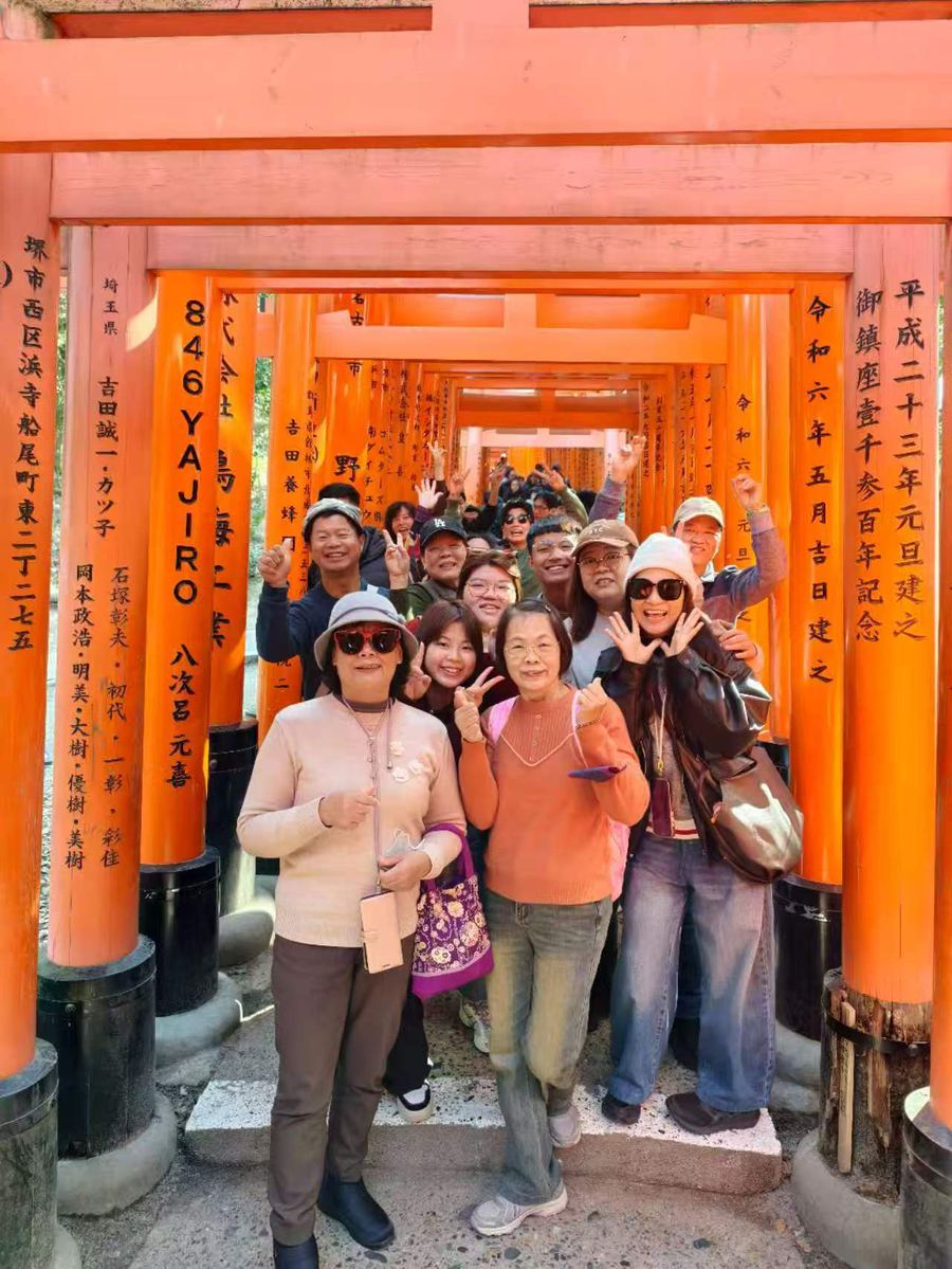 Group inside the thousand torii gates at Fushimi Inari