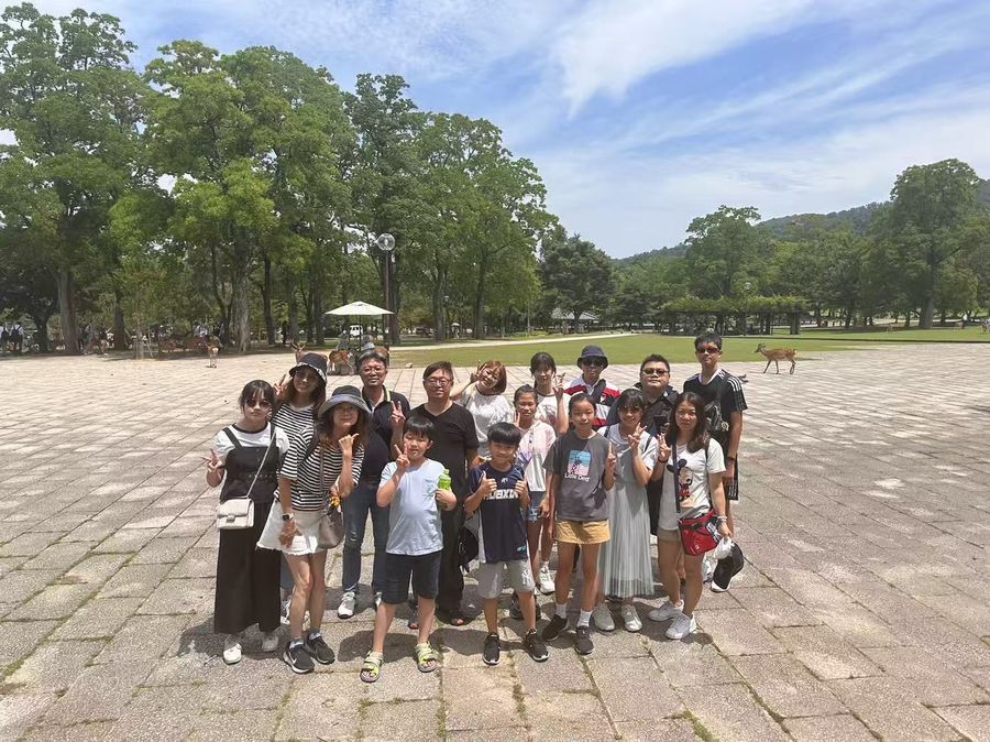 A group meeting deer at Nara Park